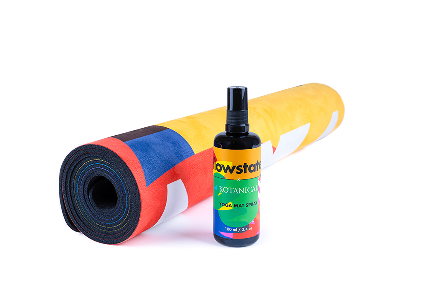 FLOWSTATE X KOTANICAL MAT SPRAY alongside a rolled up yoga mat